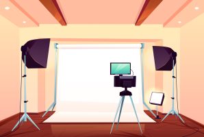 Professional photo studio interior cartoon vector Photo or video studio workshop equipped with modern professional light equipment, camera, external monitor on tripod, flashes in softboxes on stands and white background cartoon vector illustration